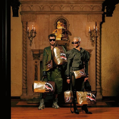TRACOLLINA SHARKS IN PARIS GOLD DRIP ART. 910B9344NSZ SPRAYGROUND
