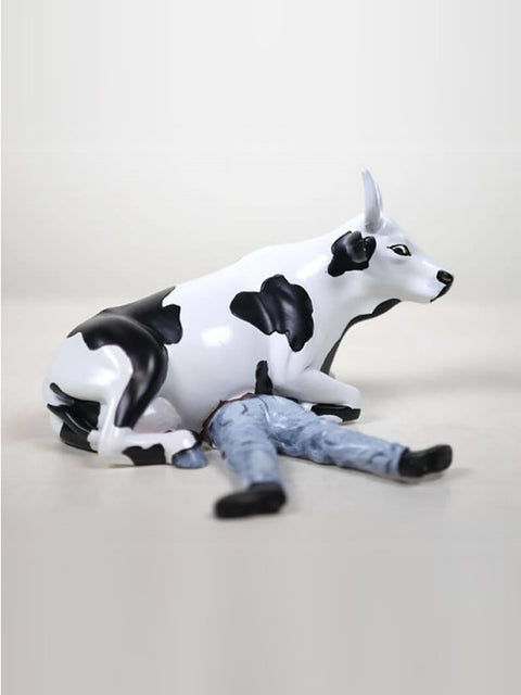 COW PARADE M COW SITTING ON MAN/NI  MU ART. 47811